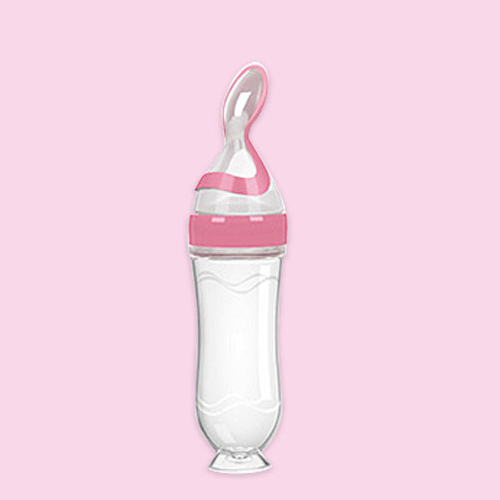 Elevate Your Baby's Feeding Experience with Our Silicone Squeeze Feeding Spoon & Bottle